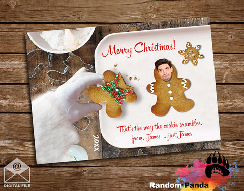 Funny Gingerbread cookies Christmas Card with a face on a tray with 'Merry Christmas!' text, surrounded by cookie cutters and flour.