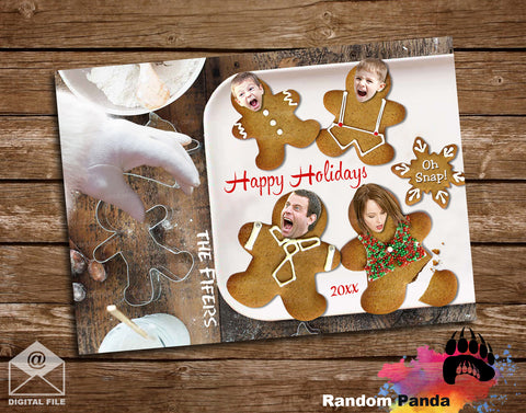 Funny Christmas Holiday card with gingerbread family design on a wooden surface, featuring Santa hand.