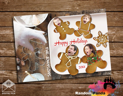 Funny Christmas Holiday card with gingerbread family design on a wooden surface, featuring Santa hand.