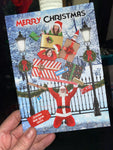 Funny Christmas Card, Child Dropping Family Inside Xmas Gifts