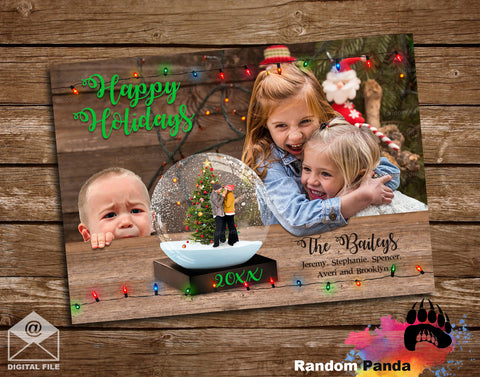 Personalized Funny Christmas holiday card with children and parent's trapped inside of a snow globe on a wooden background.